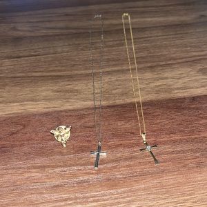 Two necklaces and one shirt pin
